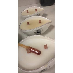 Ceramic teardrop-shaped bowl candle